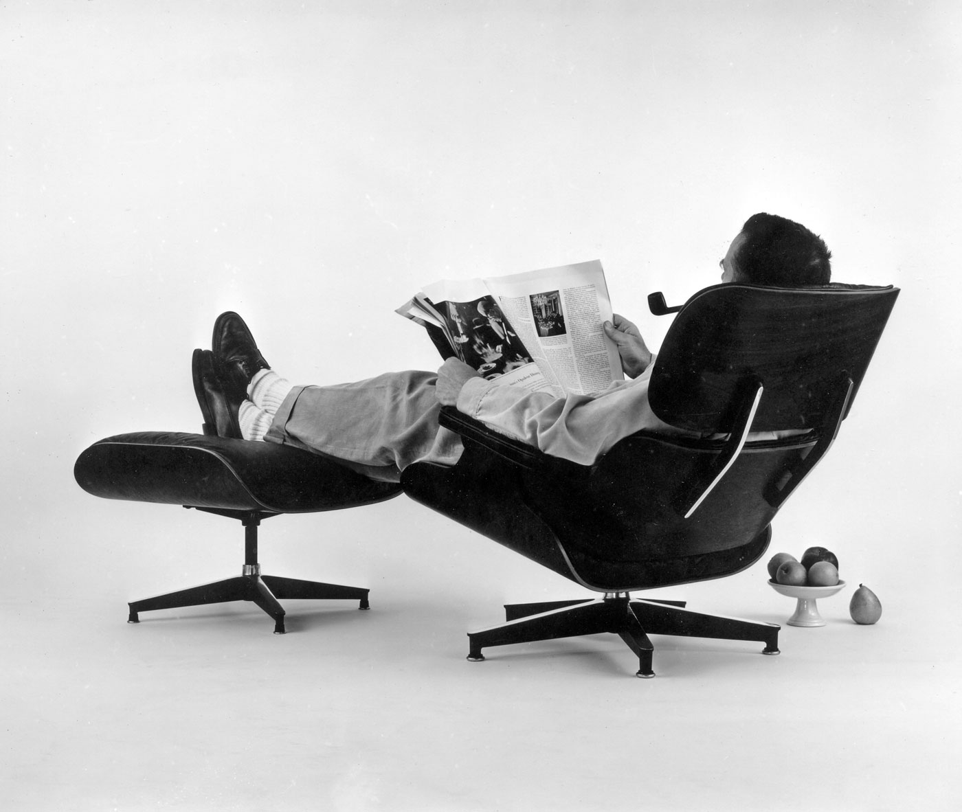 18. An Eames Celebration. Charles Eames Posing In The Lounge Chair Photo For An Advertisement 1956. ∏ Eames Office LLC 